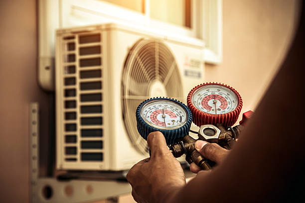 Professional Air Conditioning Service technician working in Richmond, KY